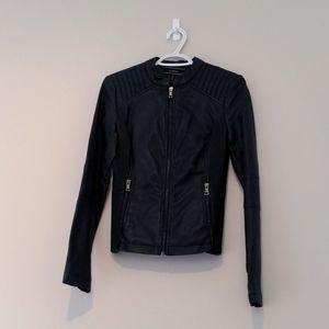Black fully lined moto type jacket. Small le Chateau. Hardly worn.